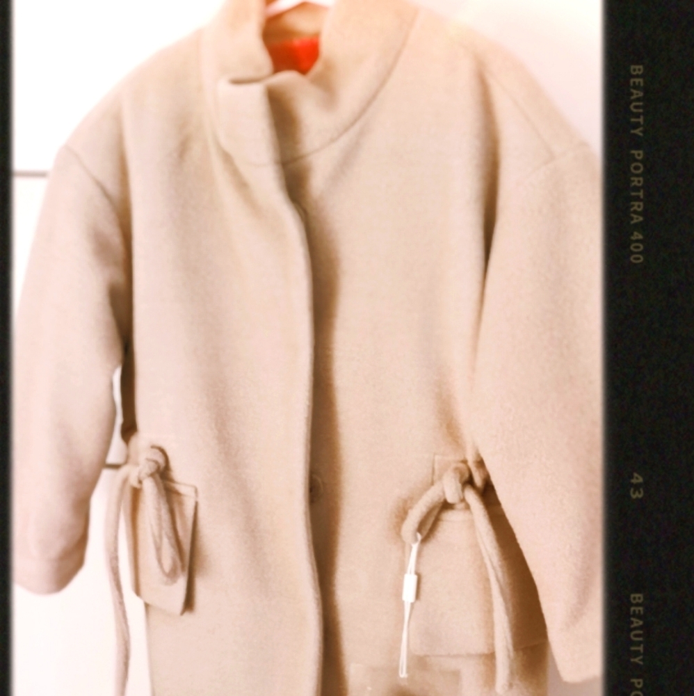 Very sophisticated  olive green winter coat.